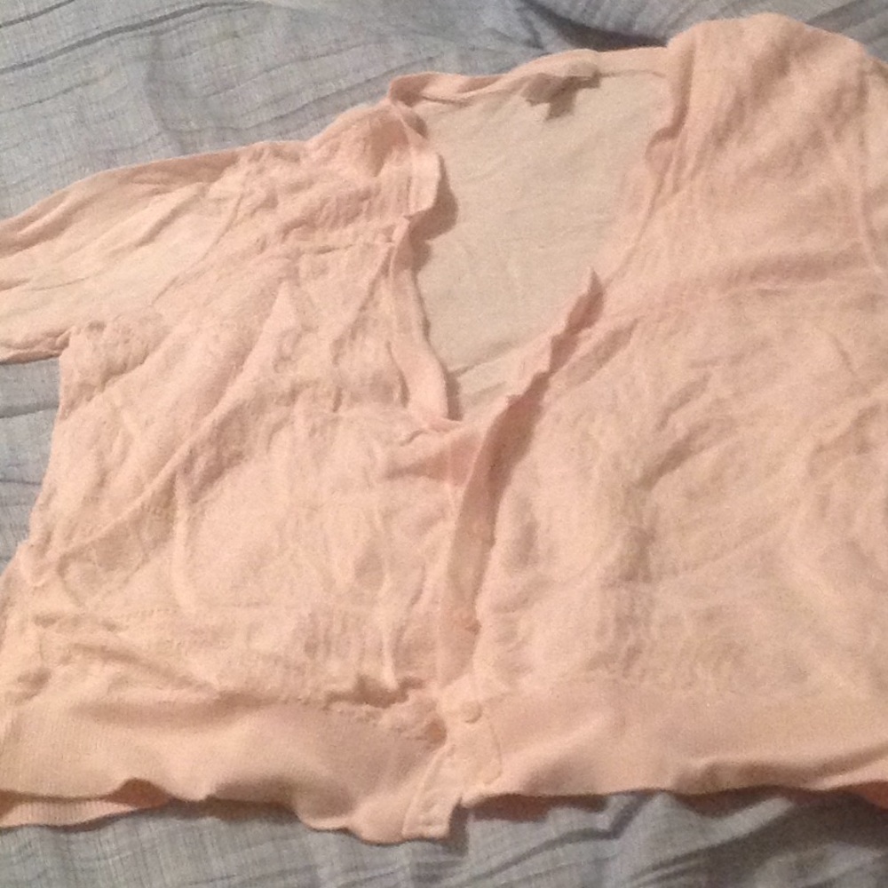 Pale pink cardigan with lace patterned front